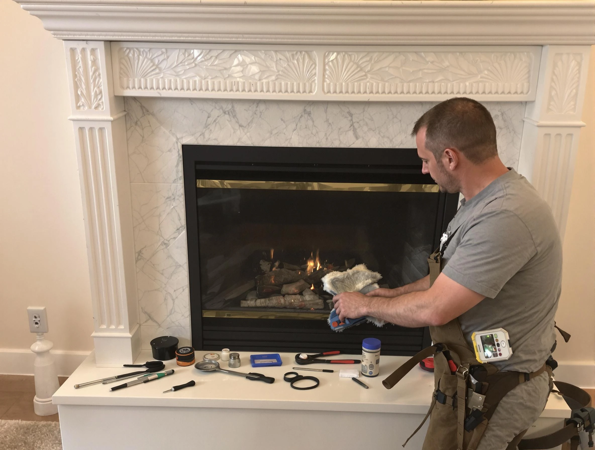 Fall River Chimney Sweep performing fireplace maintenance in Fall River, MA